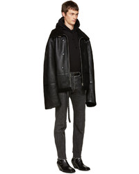 Мужское черное пальто от Vetements