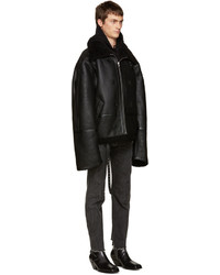 Мужское черное пальто от Vetements