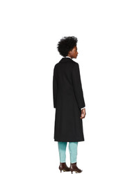 Женское черное пальто от Gucci