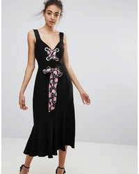 Черное платье-миди с цветочным принтом от Warehouse