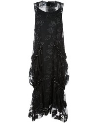 Черное платье с украшением от Simone Rocha