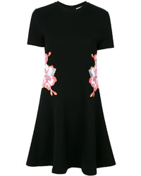 Черное платье с цветочным принтом от Carven