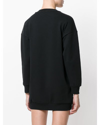 Черное платье-свитер с принтом от Moschino