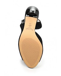 Черные босоножки на каблуке от Elche