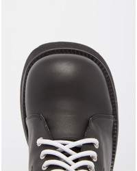 Женские черные ботинки от Unif