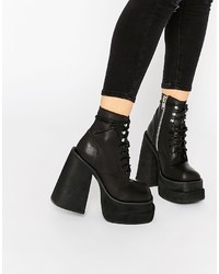 Женские черные ботинки от Unif