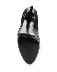 Черные ботфорты от Steve Madden