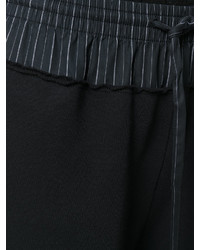 Черные брюки-клеш от MM6 MAISON MARGIELA