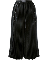 Черные брюки-кюлоты со складками от Comme des Garcons