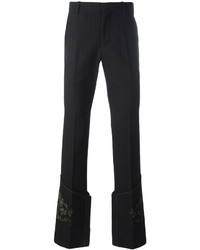 Мужские черные брюки с принтом от Alexander McQueen