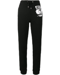 Женские черные брюки с принтом от Moschino