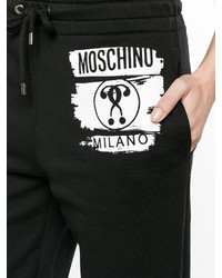 Женские черные брюки с принтом от Moschino