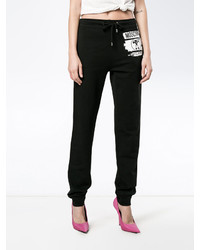 Женские черные брюки с принтом от Moschino