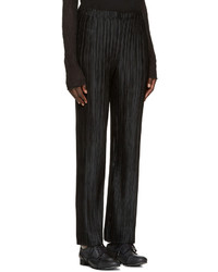 Женские черные брюки со складками от Issey Miyake