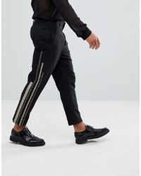 Черные брюки чинос с принтом от ASOS DESIGN