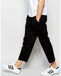 Мужские черные брюки от Izzue