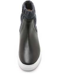 Женские черные высокие кеды от Maison Margiela