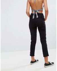 Женские черные джинсы c бахромой