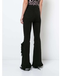 Черные джинсы-клеш от Thomas Wylde