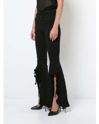 Черные джинсы-клеш от Thomas Wylde