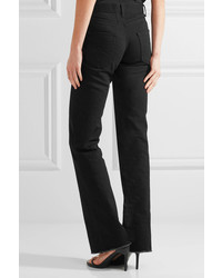 Черные джинсы-клеш от Saint Laurent