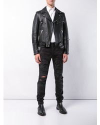 Мужские черные джинсы с камуфляжным принтом от Balmain