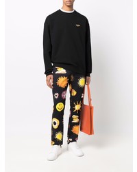 Мужские черные джинсы с принтом от Moschino