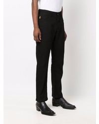 Мужские черные джинсы от Pleasures