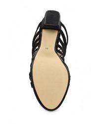 Черные замшевые босоножки на каблуке от Arnaldo Toscani