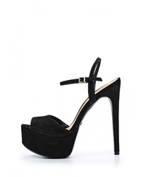 Черные замшевые босоножки на каблуке от Schutz