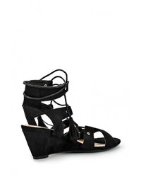 Черные замшевые босоножки на танкетке от Anesia