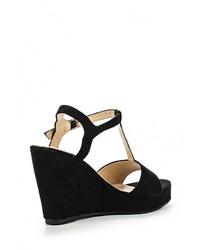 Черные замшевые босоножки на танкетке от Anesia