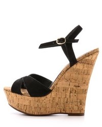 Черные замшевые босоножки на танкетке от Schutz