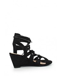 Черные замшевые босоножки на танкетке от Stephan