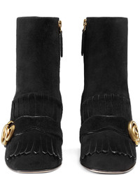 Черные замшевые ботильоны c бахромой от Gucci