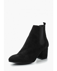 Черные замшевые ботильоны от Garro