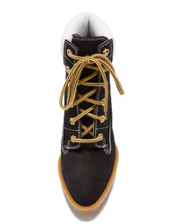 Черные замшевые ботильоны от Maison Margiela