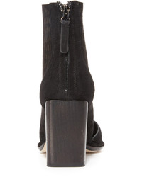 Черные замшевые ботильоны от Zero Maria Cornejo