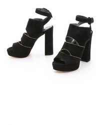 Черные замшевые массивные босоножки на каблуке от Stuart Weitzman