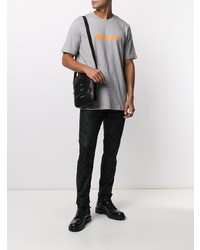 Мужские черные зауженные джинсы с принтом от Diesel