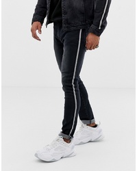 Мужские черные зауженные джинсы с принтом от Liquor N Poker