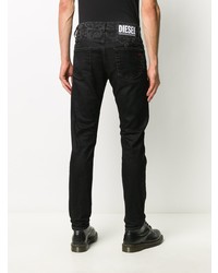 Мужские черные зауженные джинсы с принтом от Diesel