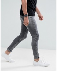Мужские черные зауженные джинсы с принтом от Calvin Klein Jeans
