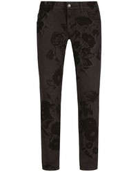 Мужские черные зауженные джинсы с цветочным принтом от Dolce & Gabbana