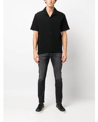 Мужские черные зауженные джинсы от Dondup