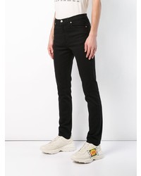 Мужские черные зауженные джинсы от Gucci