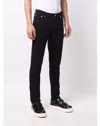 Мужские черные зауженные джинсы от Calvin Klein
