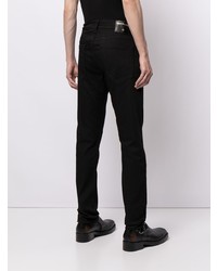 Мужские черные зауженные джинсы от True Religion