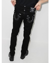 Мужские черные зауженные джинсы от True Religion