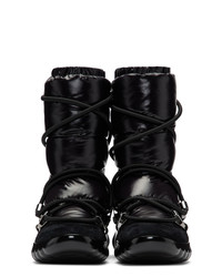 Женские черные зимние ботинки от Moncler